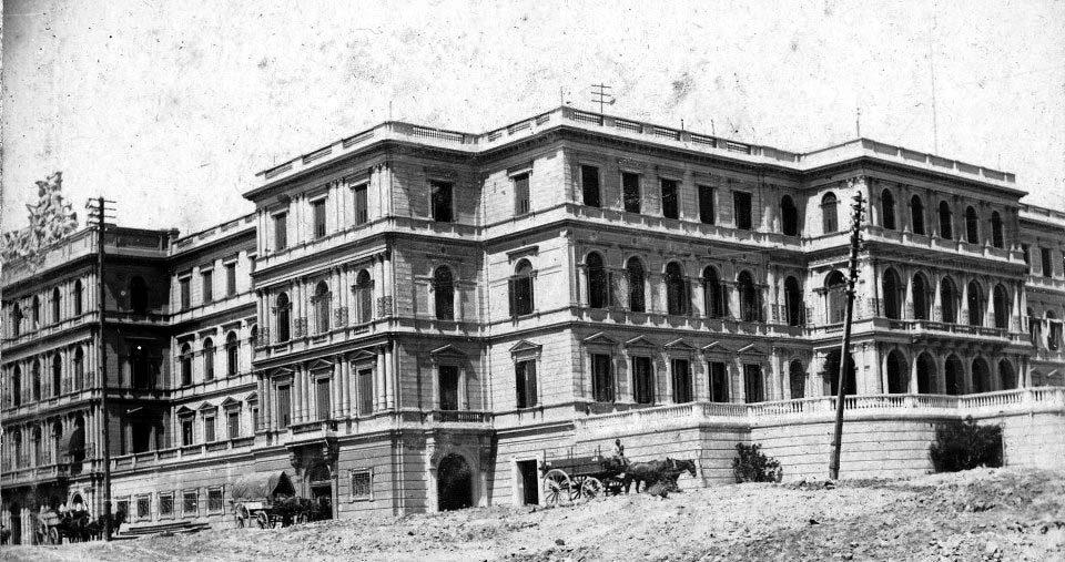 Casa Rosada, c. 1890. Unidentified photographer. Period photograph of the Casa de Gobierno.. Street photograph.