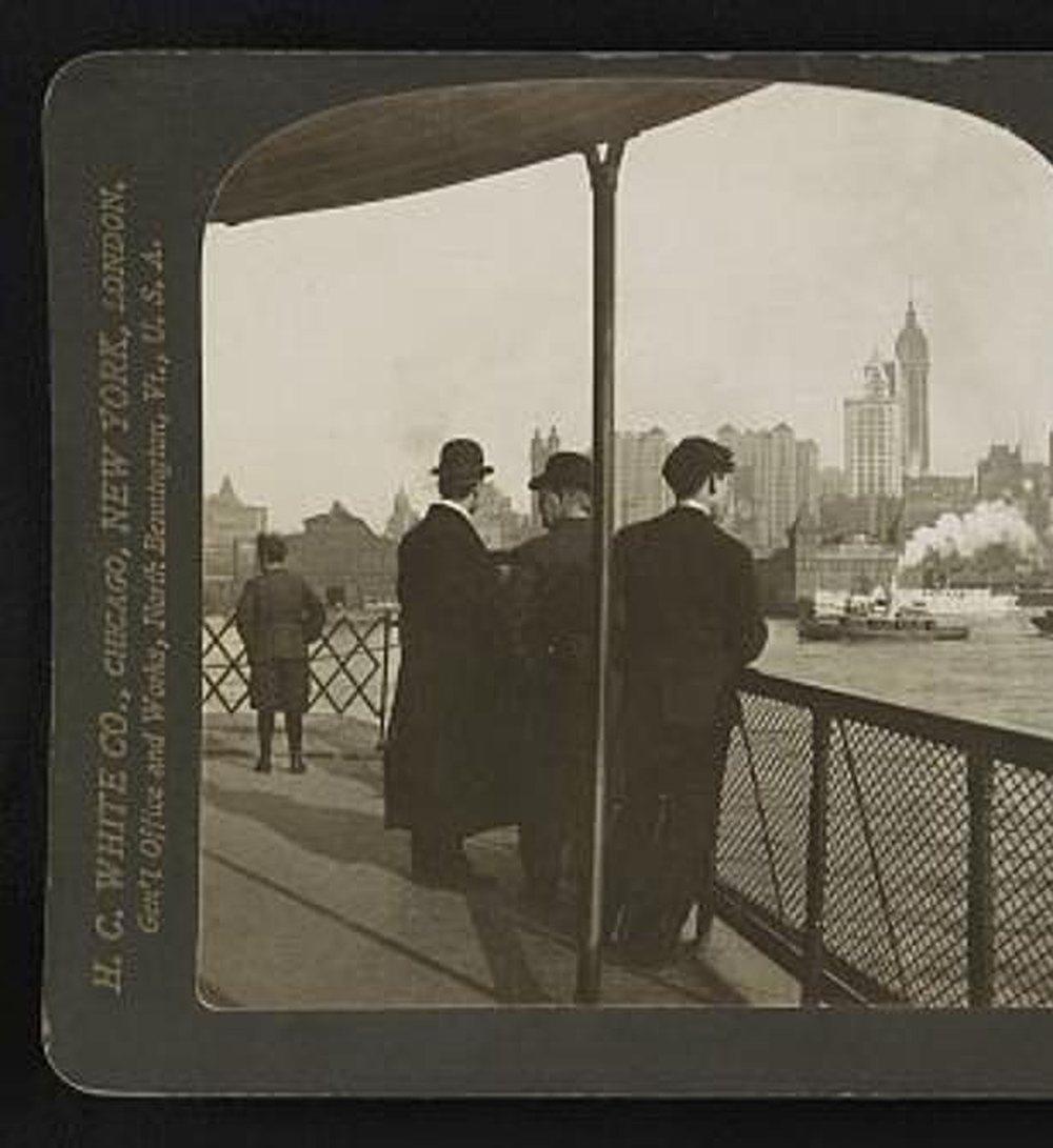 Singer Tower from the North River, c. 1909. Period stereograph from a ferry in the Hudson.. Elevated photograph.