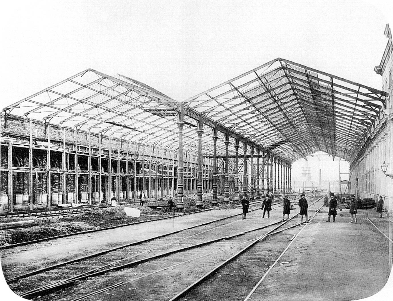 Staatsbahnhof under construction, 13 March 1870, 1870. Hermann Voigtländer. Street photograph.